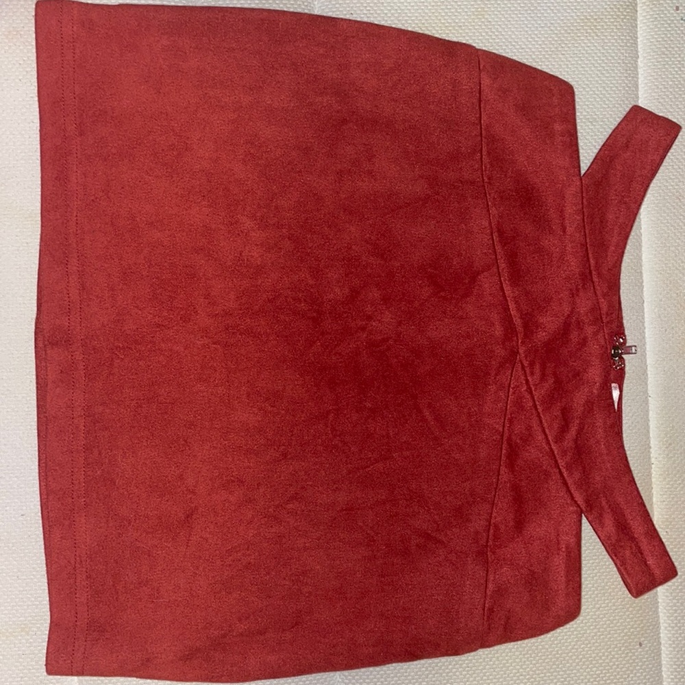 Luxxel: burgundy velvet size small skirt with slits at hips and zipper behind